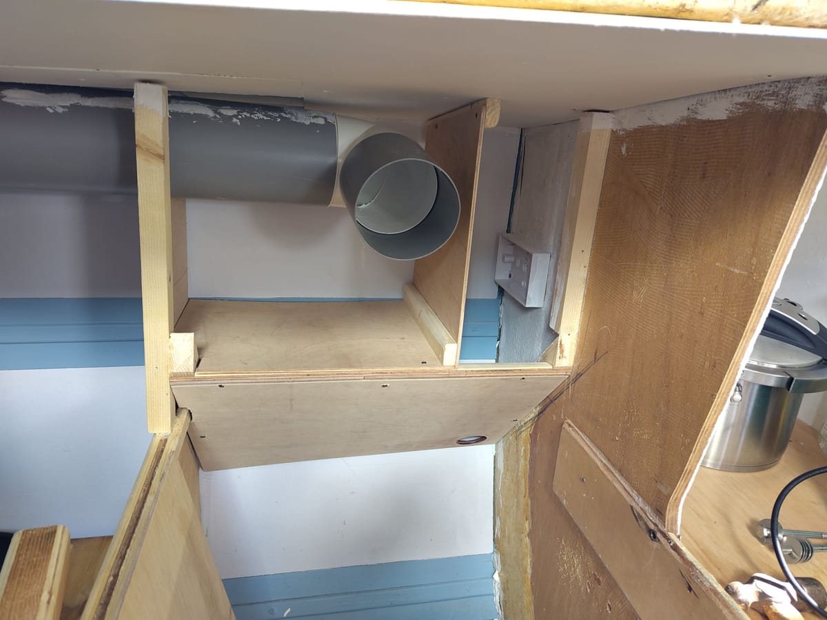 Galley cupboard behind the cooker box