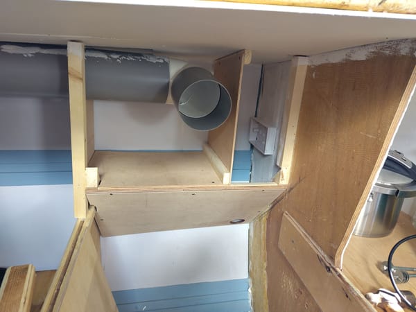 Galley cupboard behind the cooker box